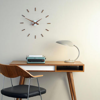 Nomon Sunset I wall clock walnut steel with details in steel Buy now on Shopdecor